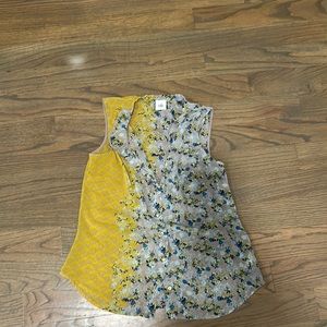 Cute sleeveless button down shirt